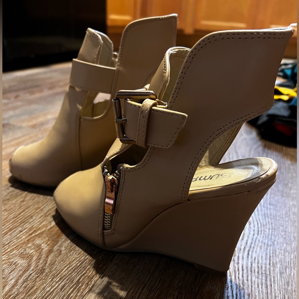 Nude colour wedges. Open heel and peep toe.